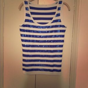 Diane Gilman sequined tank tops.